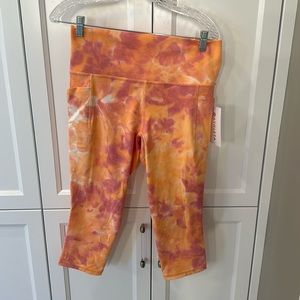 Athleta salutation capri leggings. New with tags. Large.